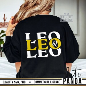May include: Black sweatshirt with a white and gold design that says "LEO" three times with the Leo zodiac symbol in the middle. The design is on the back of the sweatshirt.