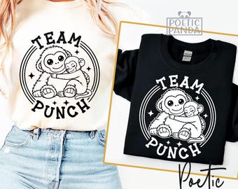 Équipe coup de poing SVG PNG, bébé macaque étreignant peluche Svg, conception de chemise singe viral, cher punch Svg, singe mignon Cricut Png
