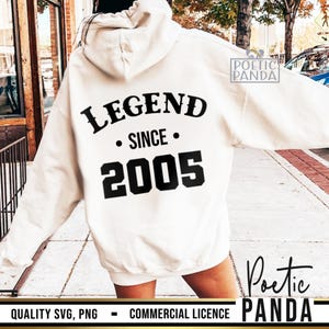 May include: White hooded sweatshirt with black text that reads "LEGEND SINCE 2005".