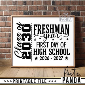 May include: A rectangular sign in a wooden frame featuring black text on a white background. The text reads Class of 2030, Freshman year, First day of high school, and 2026-2027, decorated with small stars and a vertical dashed line.