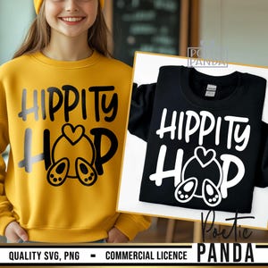 Może przedstawiać: Żółto-czarna bluza z napisem "Hippity Hop" i grafiką królika. Tekst jest biały na czarnej bluzie i czarny na żółtej bluzie.
