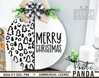 May include: A white round wooden sign with a black and white Christmas tree pattern on the left side and the words "Merry Christmas" in black on the right side. A black and white checkered bow with a green sprig is attached to the top of the sign.