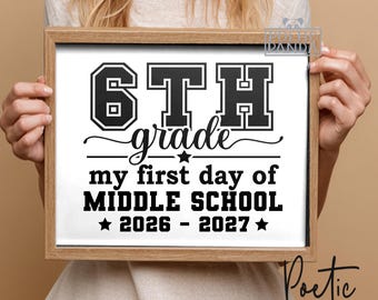 May include: A framed print with the text "6TH grade my first day of MIDDLE SCHOOL 2026-2027". The text is in black on a white background, with a wooden frame. The words "PRINTABLE FILE" are at the bottom.