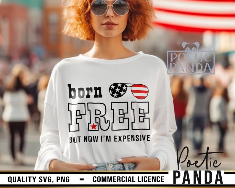 May include: White t-shirt with a red, white, and blue American flag design. The text "born FREE BUT NOW I'M EXPENSIVE" is printed on the shirt.
