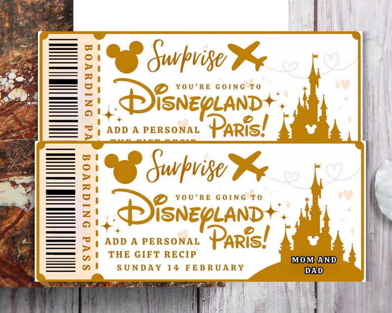 May include: Two gold-colored Disneyland Paris surprise tickets. Each ticket features a Mickey Mouse head, an airplane, and a castle silhouette. Text includes "Surprise," "You're going to Disneyland Paris!" and "Mom and Dad."