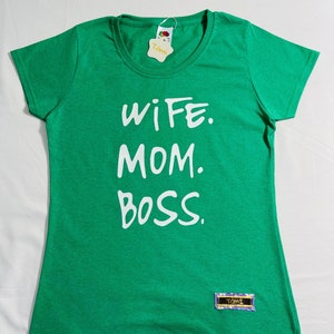 May include: Green t-shirt with white text that reads "Wife. Mom. Boss."