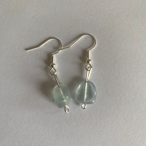 Boucles d'oreilles pendantes en pierres précieuses bleues