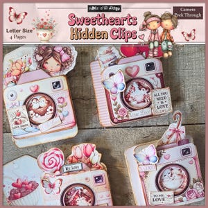 Könnte beinhalten: Eine Sammlung dekorativer, papierbasierter Kamera-Clips in Rosa, Weiß und Rot, verziert mit Schmetterlingen, Herzen und floralen Akzenten. Die Clips zeigen romantische Bilder und Texte wie "True Love" und "To My Love".