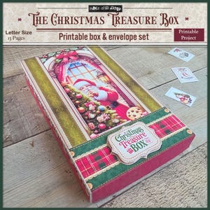 May include: A rectangular Christmas Treasure Box with a festive design. The box features a Santa Claus illustration, a red plaid pattern, and the text "The Christmas Treasure Box." The set includes printable box and envelope templates.