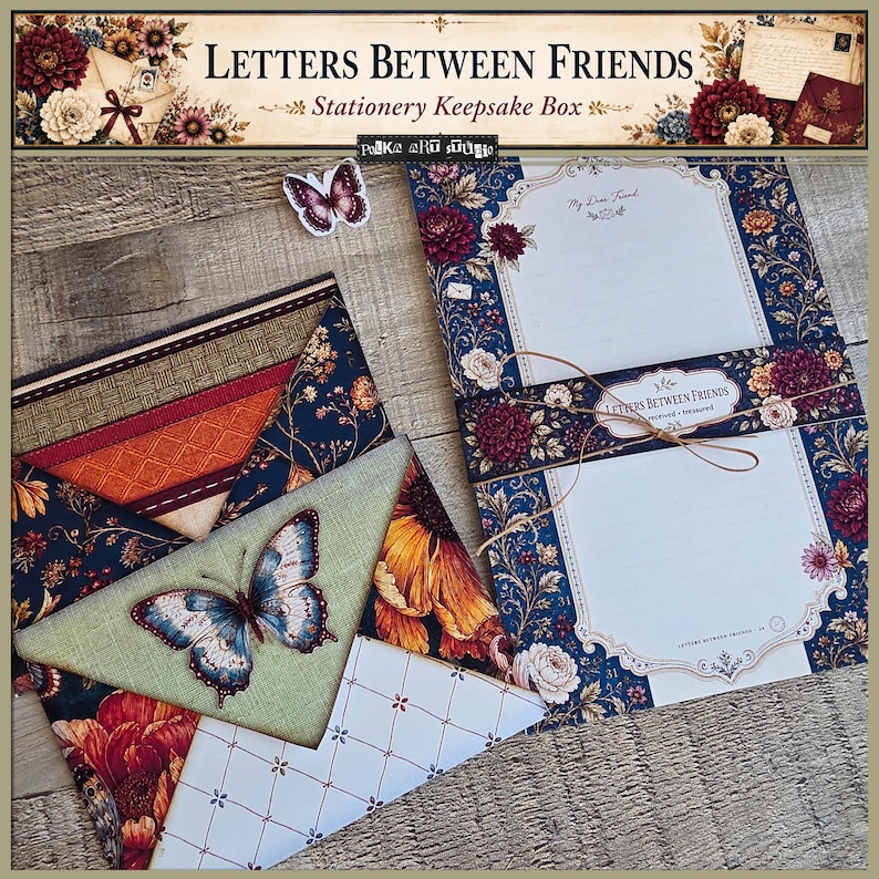 May include: A stationery set titled Letters Between Friends featuring a keepsake box, envelopes, and writing paper. The items display floral patterns, deep red and blue colors, and butterfly illustrations. A thin twine wraps around the paper.