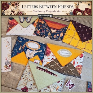 May include: A collection of stationery envelopes featuring various patterns including butterflies, floral motifs, autumn leaves, and vintage-style fountain pens. The envelopes are decorated with labels reading Dear Friend and Air Mail, showcasing a mix of yellow, blue, green, and burgundy colors.