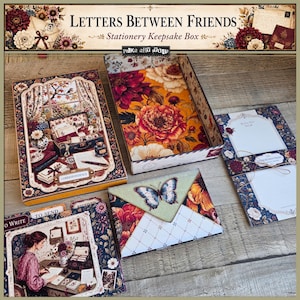 May include: A stationery keepsake box set titled Letters Between Friends, featuring a rectangular box with a floral interior, a matching lid with a desk illustration, a butterfly-adorned envelope, a folder set, and a notepad with floral borders.
