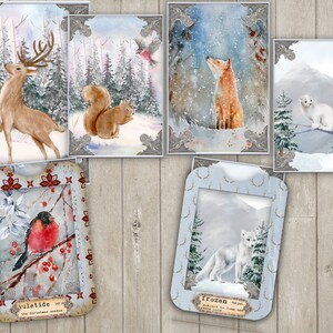 May include: A set of 10 winter-themed greeting cards featuring various animals in snowy landscapes. The cards are decorated with a white border and a gold frame. The cards include a deer, a squirrel, a fox, a white cat, and a robin.