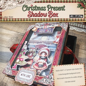 Pode incluir: Uma caixa de sombra de presente de Natal com um design festivo. A caixa apresenta uma cena de inverno com uma menina, uma coruja e uma árvore de Natal. O texto "Welcome to the North Pole" é visível. A caixa tem aproximadamente 20 cm x 15 cm.