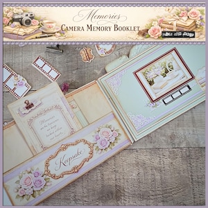 May include: An open scrapbook with a vintage aesthetic. The cover reads "Memories CAMERA MEMORY BOOKLET." Inside, a framed picture, film strip accents, and floral embellishments are visible. The word "Keepsake" is displayed on a decorative banner, and the text "Memories are the treasures we keep tucked within our hearts" is also visible.