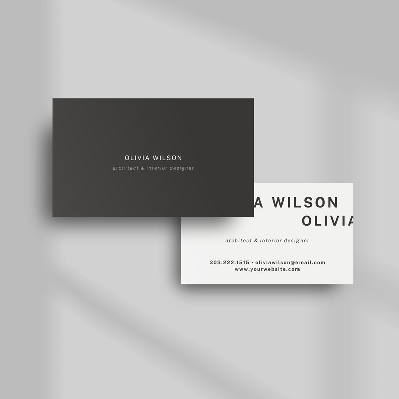 May include: A black and white business card with the name Olivia Wilson, architect and interior designer, and contact information.
