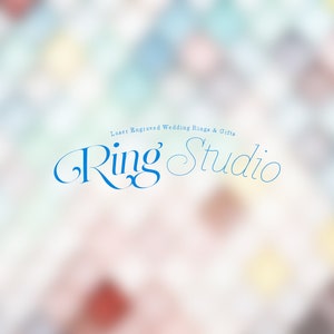 May include: A blue and white logo on a blurred background. The logo says "Laser Engraved Wedding Rings & Gifts Ring Studio".