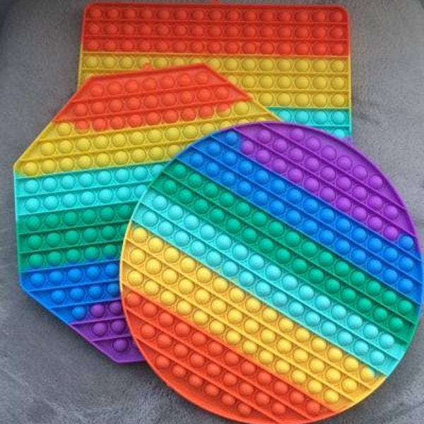 Giant Rainbow Pop Its - loads of pops over 150 on each Plus a Free Gift with Every Order
