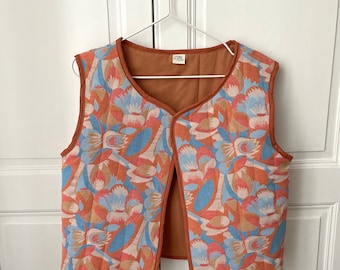 Orange and blue sleeveless vest