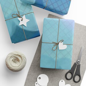 May include: A white ceramic mug with a black handle and the text "But First, Coffee" in a bold, black font. The mug is set against a blurred background, suggesting a cozy setting. The mug appears to be approximately 4 inches tall.