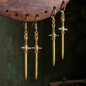 Boucles d'oreilles épée dorée - le livre des chevaliers