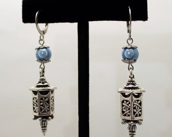 Lantern earrings with blue satin luster beads