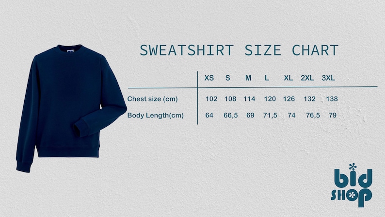 May include: A navy blue sweatshirt size chart with measurements in centimeters for chest and body length. The chart includes sizes XS, S, M, L, XL, 2XL, and 3XL. The chart is labeled "SWEATSHIRT SIZE CHART" and "bid SHOP".