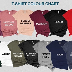 May include: T-shirt color chart showing different colors of t-shirts, including heather maroon, heather mauve, sunset heather, maroon, black, red, forest green, white, military green, dark grey heather, sport grey, navy, and heather midnight.