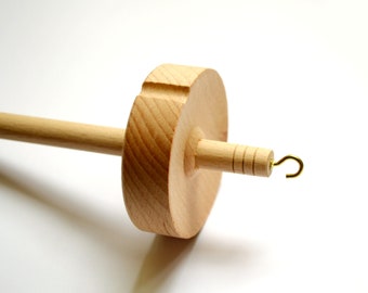 Drop spindle for spinning. Top whorl drop spindle