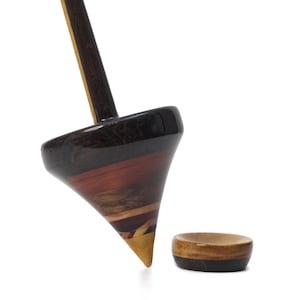 Teacup spindle. Support spindle for spin with cap