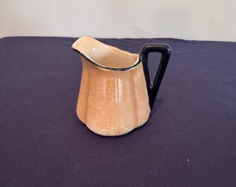 Vintage Lusterware Porcelain Creamer Black Handle Peach or Orange Colored