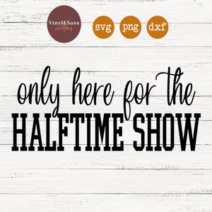 May include: Black and white text graphic on a white wood background. The text reads "only here for the HALFTIME SHOW".