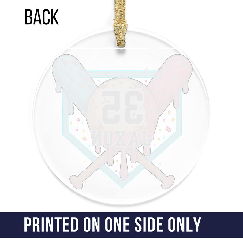 May include: Clear, round ornament with a baseball-themed design. The ornament features a baseball with the number 26, crossed bats, and the text "MOXAL". The ornament has a gold ribbon for hanging. The text "PRINTED ON ONE SIDE ONLY" is at the bottom.