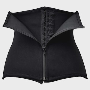May include: A black waist trainer featuring a smooth, matte exterior surface. The garment includes a central vertical zipper closure and an interior panel with multiple rows of metal hook-and-eye fasteners to provide an adjustable, secure fit.