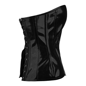 May include: A black patent leather corset with a lace-up back and boning. The corset has a strapless design and a smooth, shiny finish.