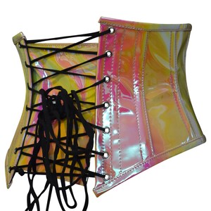 May include: A pink and yellow iridescent corset with black lacing in the back. The corset has a shiny, glossy finish.