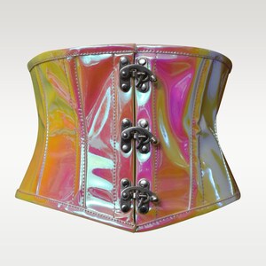 May include: A shiny iridescent pink and yellow corset with silver buckles and a front closure.