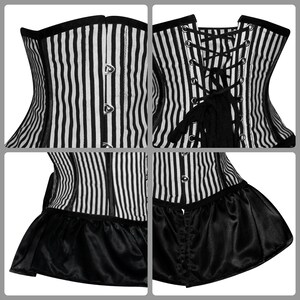 May include: A black and white striped corset with a black satin ruffle at the bottom. The corset has a lace-up back and metal eyelets.