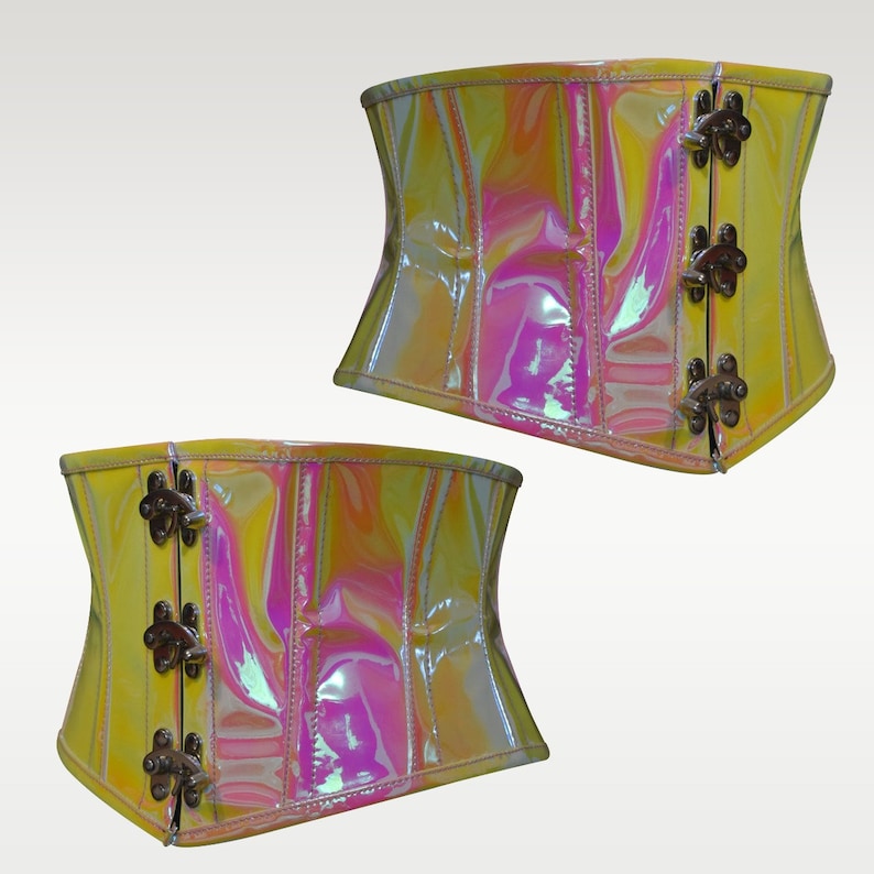 May include: Two iridescent yellow and pink corsets with a front closure and multiple metal clasps.
