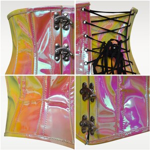 May include: A pink and iridescent corset with black lacing in the back and silver metal clasps on the sides.