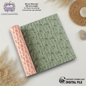 May include: A cylindrical rolling pin with a repeating embossed pattern of Easter bunnies, carrots, and decorated eggs. The text reads 20 mm Diameter, 100 mm Length for Resin 3d printing, Commercial use allowed, and STL INSTANT DOWNLOAD DIGITAL FILE.