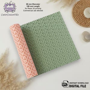 May include: A rolled pink patterned sheet with a floral design next to a green patterned sheet. The image includes text that reads "20 mm Diameter 100 mm Length for Resin 3d printing Commercial use allowed".