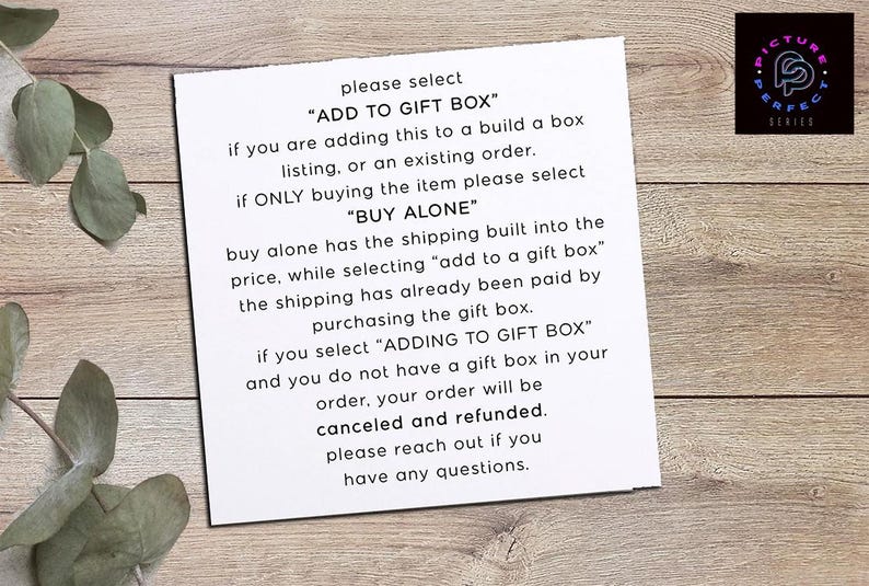 May include: A white paper with text explaining how to select gift box options. The text includes instructions on choosing "ADD TO GIFT BOX" or "BUY ALONE". A logo with the text "PICTURE PERFECT SERIES" is in the upper right corner.