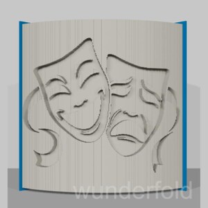 May include: A light gray, curved object featuring the classic comedy and tragedy theater masks. The masks are carved into the surface, with the word "wunderfold" at the bottom. The edges are outlined in blue.