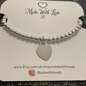 Sterling Silver beaded bracelet with Heart charm