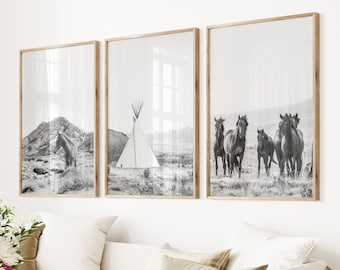 May include: Three black and white framed prints. The left print shows a lone horse in a field. The center print shows a teepee in a field. The right print shows a group of horses running in a field.