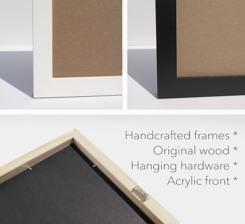 May include: A close-up of a wooden picture frame with a black mat and hanging hardware. The frame is handcrafted from original wood and has an acrylic front.