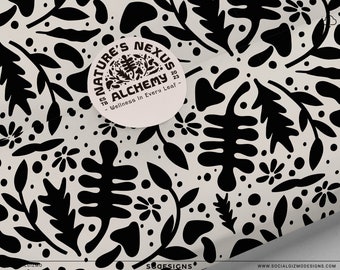 May include: Black and white floral pattern wrapping paper with a round sticker that says "Nature's Nexus Alchemy - Wellness in Every Leaf" with the year 2023.