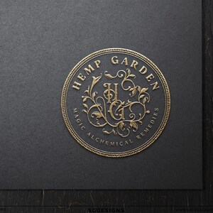 Circular vintage emblem logo with apothecary typography and decorative botanical elements. Mystical herbalist branding design inspired by old botanical labels and antique remedy packaging, suitable for handmade candle companies, herbal skincare brands, botanical wellness businesses, and artisan product makers.