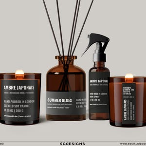 Peut inclure: Ensemble de produits parfumés en verre ambré, comprenant une bougie, un diffuseur à roseaux et un spray d'ambiance. La bougie est étiquetée "Ambre Japonais", le diffuseur "Summer Blues", et le spray "Ambre Japonais". Fabriqué à la main à Londres.